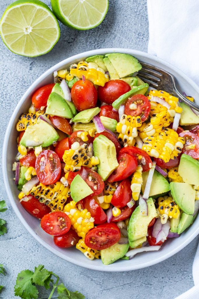 Corn tomato Avocado salad in a bowl 