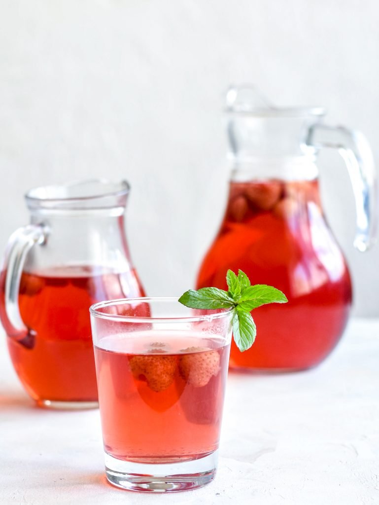 Kompot in a jar and a glass cup