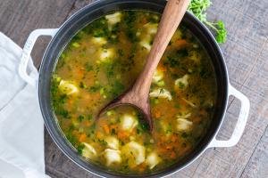 Pelmeni soup in a pot