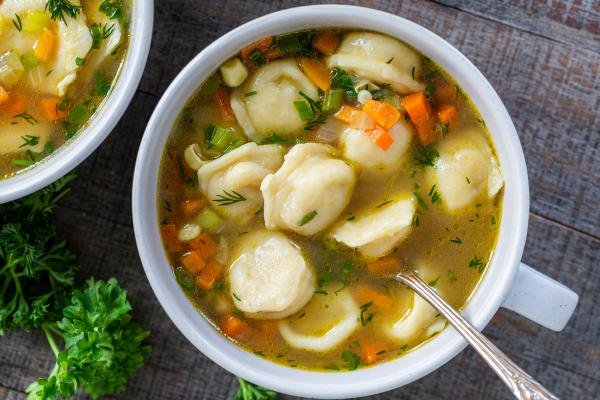 Pelmeni soup in a bowl