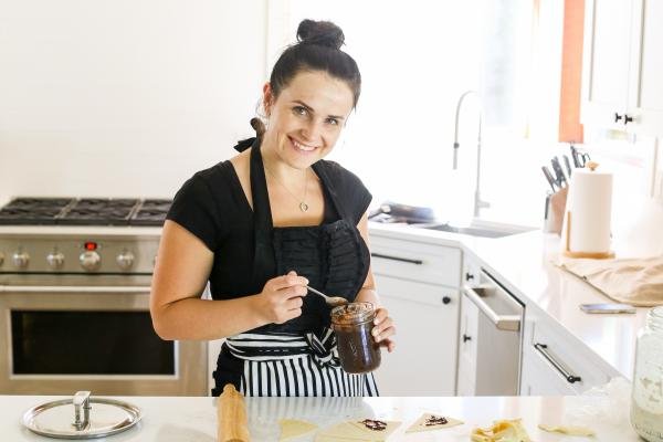 Natalya cutting rogaliki dough