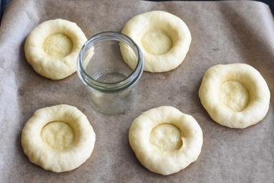 Vatrushka dough for buns on a baking sheet