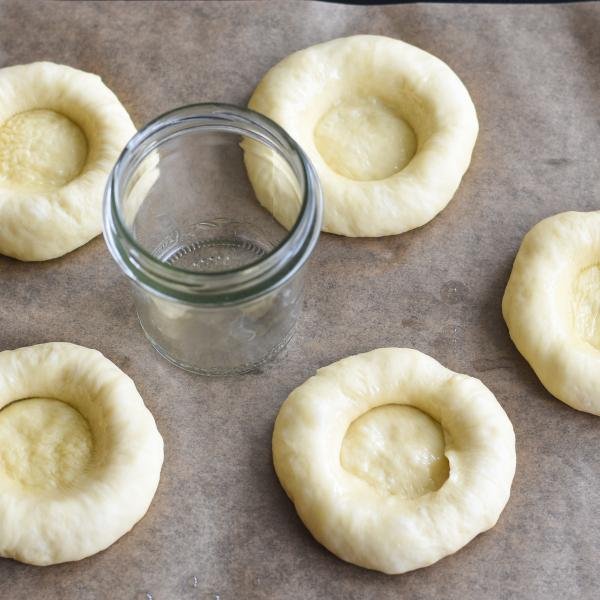 Vatrushka dough for buns on a baking sheet
