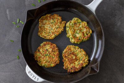 Zucchini fritters in a pan