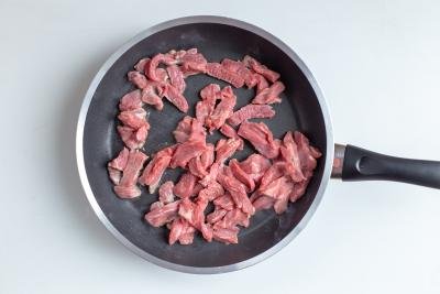 Beef cooking on the skillet