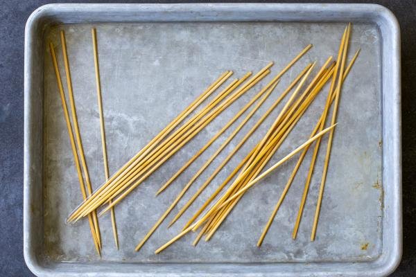 wooden skewers soaking in a water