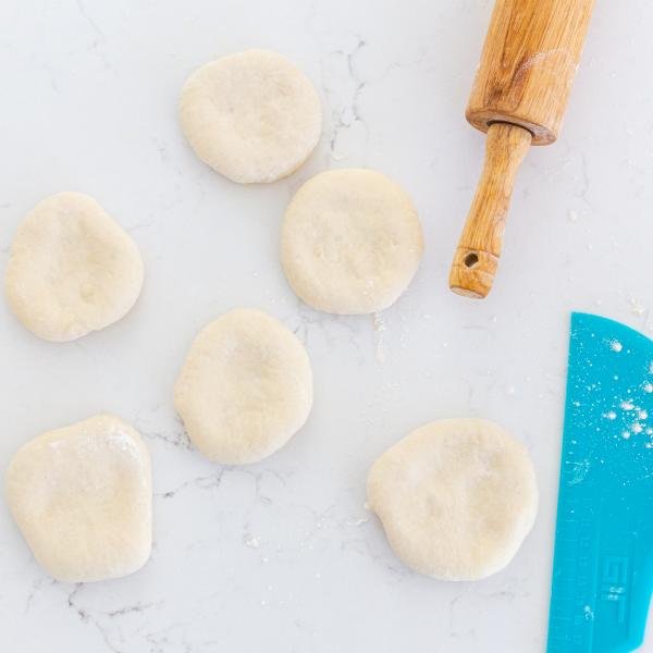 formed piroshki on a counter top