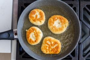Piroshki in a frying pan