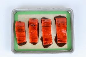 Salmon slices glazed with brown sugar