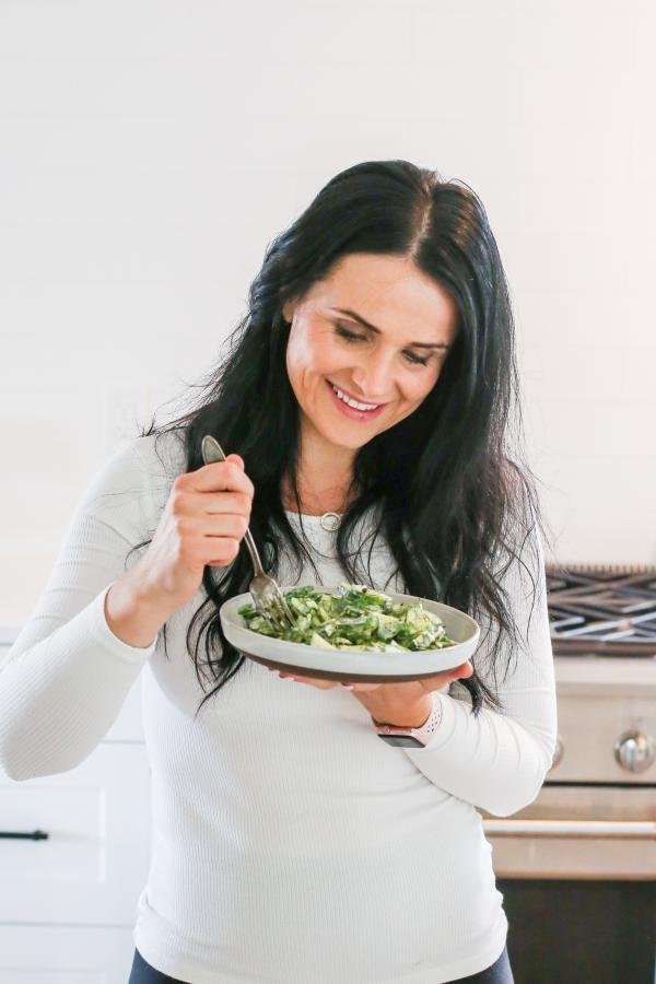 Natalya with the plate of Creamy Cucumber Salad