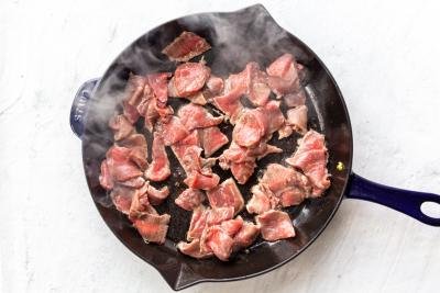 beef getting cooked in the skillet