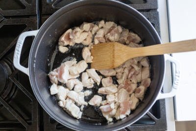 chicken cooking in a pot