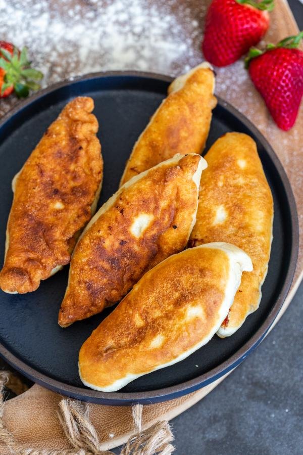 Friend fruit piroshki in a plate