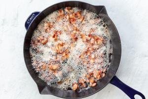 crispy bacon in a frying pan