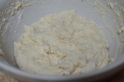 Rogaliki dough mixture mixed together in a mixing bowl