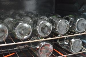 2 racks of jars getting sterilized in the oven