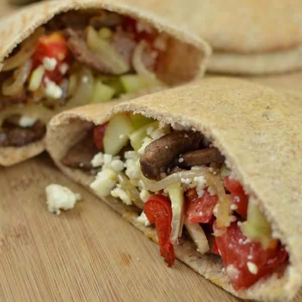 Pita Pocket cut in half on a cutting board