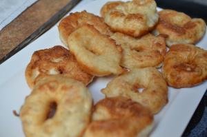 Moroccan Donuts fried and tossed in sugar on a plate