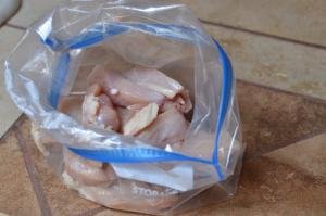 Thin sliced pieces of chicken in a ziploc bag