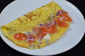 Tomato Three Cheese Omelet on a plate