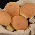 Quick Wheat Buns in a towel covered basket