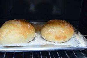 2 loaves of no knead bread baking in the oven