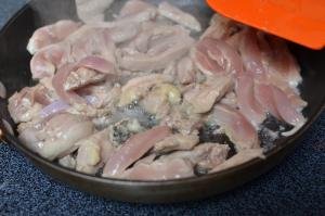 Chicken cooking on a skillet