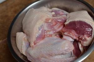 Duck cut into sections and placed in a bowl