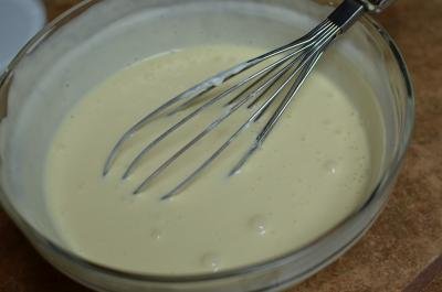 Sour cream, eggs, and salt whisked together in a large bowl