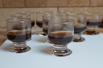 In small glass cups coffee gelatin mixture is poured in