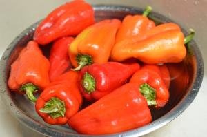Mini Bell Peppers being washed in a bowl
