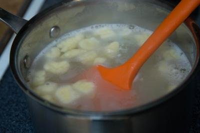 Homemade Gnocchi being boiled in a pot
