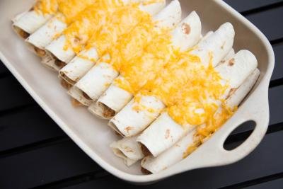 Mexican Crock Pot Chicken wrapped in enchiladas