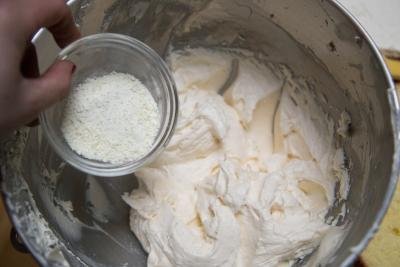 Dry milk being added to the cream mixture