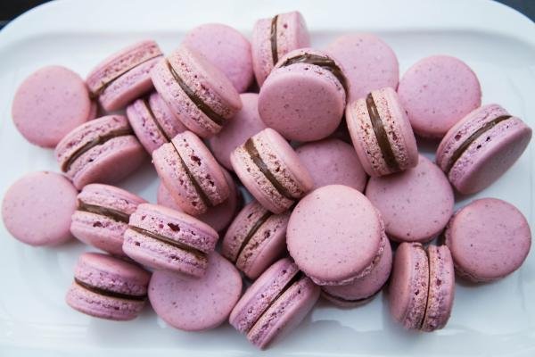 A pile of pink macarons