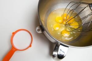 6 eggs in a KitchenAid mixture with sugar besides it