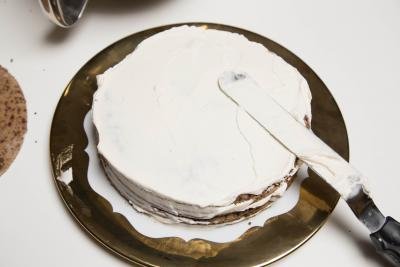Chocolate-honey Layer Cake with the cream spread on the sides and on the top