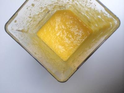 Blended mango mixture in a blender
