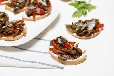 Mushroom Bell Pepper Canapes on the table and in rows on a plate