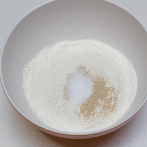 Flour, salt and yeast placed together in one bowl
