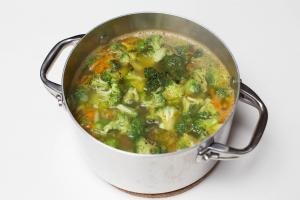 Broccoli added into the pot with soup mixture