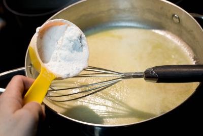 Flour being whisked into the butter/fat
