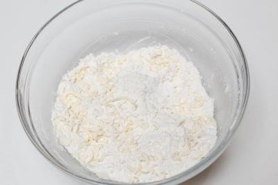 Grated butter in a bowl with flour