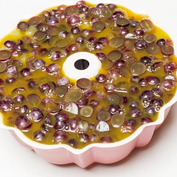 Jello cake mold filled with jello and fruits