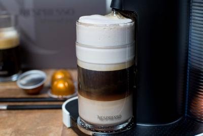 Nespresso coffee being poured into a cup