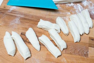 garlic knot dough cut into strips