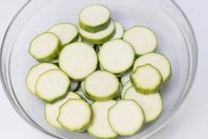 Zucchini cut into rings in a bowl