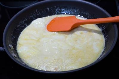 Milk and egg mixture in a skillet