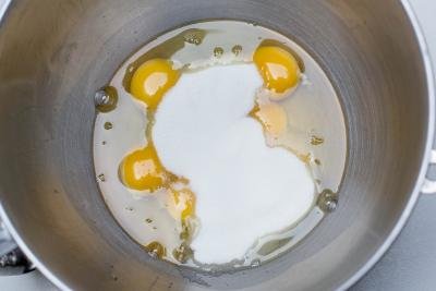 Sugar and eggs in a mixing bowl
