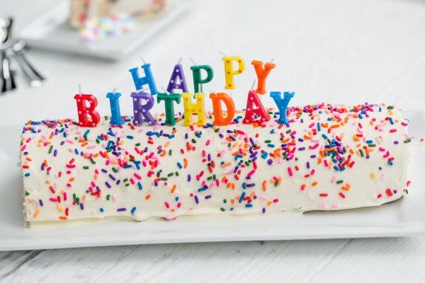 Birthday Cake Roulade on a long plate